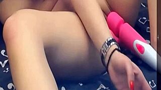 girl teases with two vibrating dildos