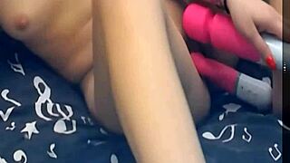 girl teases with two vibrating dildos