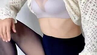 siganjue preps herself in the mirror before work, looking stunning and wet