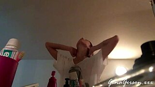 blonde teen gives footjob in home video