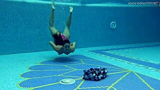 Euro milf Sazan shows off underwater hot curves