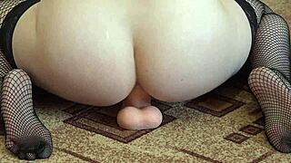 brunette in stockings bangs juicy butt with big dildo