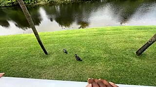 Lucy Hayz waters plants in the bedroom with curly hair