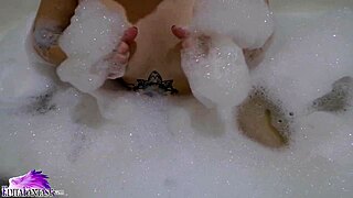 Cute Babe Sucks Huge Dildo in Bath