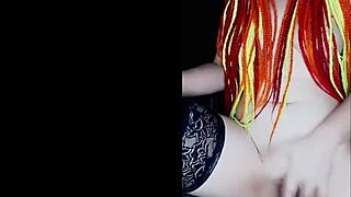 With a lover via video call, she masturbates solo