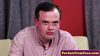 The huge-titted English redhead receives a facial cumshot