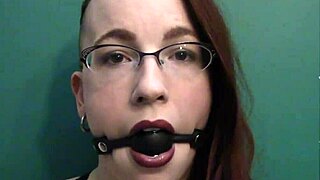 dark lipstick ballgag drooling with intense eye contact