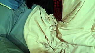 asian student couple kissing and helping each other at home.