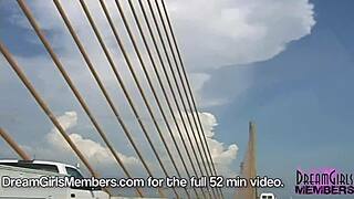 Topless brunette flashes big tits in convertible on bridge