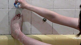 Beautiful girl Assol bathes with soapy foam all over her wet pussy and tits 😘