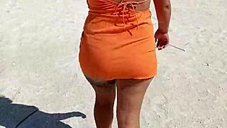 Damn, Mexican slut flashing thong and tits on public beach!
