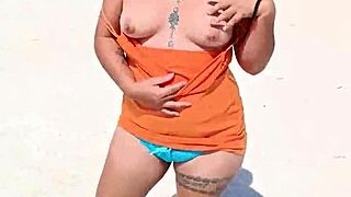 Damn, Mexican slut flashing thong and tits on public beach!