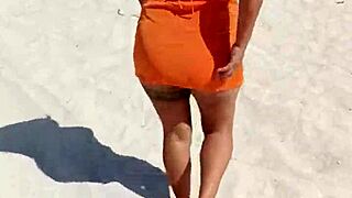 Damn, Mexican slut flashing thong and tits on public beach!