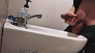 I REST MY BALLS ON THE SINK GETTING MY COCK READY FOR HUGE CUMSHOT