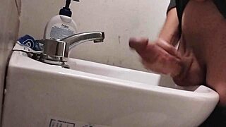 I REST MY BALLS ON THE SINK GETTING MY COCK READY FOR HUGE CUMSHOT