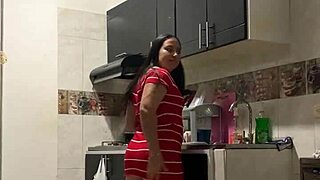 my stepmom's in the kitchen, tempting me to screw her