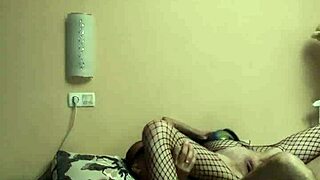 Skinny Cowgirl in Fishnet Bodysuit Rides Deep in Both Holes