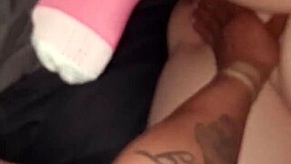 Interracial group plays with shaved wet pussy in homemade action.