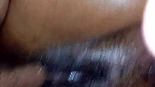 oily ebony milf's wet pussy glistening