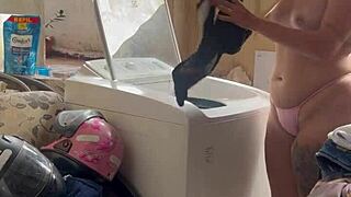 Neighbor hides while woman washes clothes with pussy and tits out