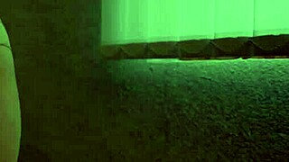 Young girl wetting maxi pad while standing in panties