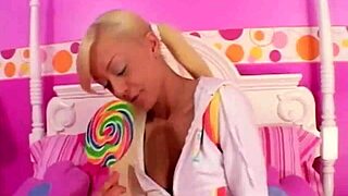 Lil Lexy gently rubs her body with a lollipop for solo pleasure