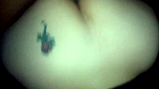 Curvy tattooed latina with piercing shows off