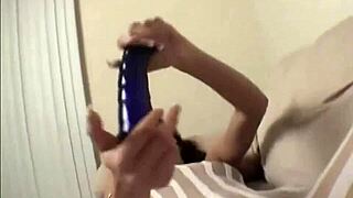 She toys her pussy through ripped stockings