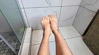 dude, this sexy young milf teases my cock with her hot feet