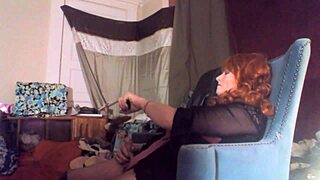 hey, watch this sexy redhead tranny swallow her 8-inch vibrating dildo!