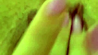 The naughty wife masturbates in shorts before work