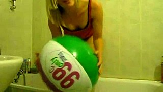 Sophie Goes Wild Masturbating with Balloons in the Living Room and Bathroom.