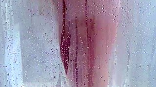 Watch her butt and bounce her curves in this explicit shower 18 only video
