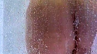 Watch her butt and bounce her curves in this explicit shower 18 only video