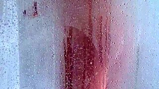 Watch her butt and bounce her curves in this explicit shower 18 only video