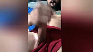 my brazilian tattooed body with pierced nipples and hard dik on bed