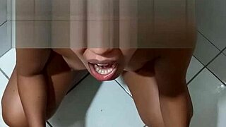 Ebony teen takes piss and gives blowjob
