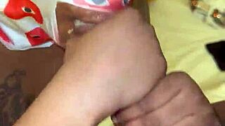 Masked performer deep throats a big black cock in POV.