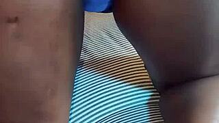 Ebony latina milf fingers herself to orgasm in blue lingerie.