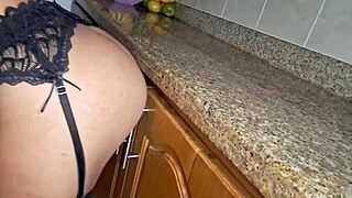 La mucama gets hot cleaning kitchen and masturbates