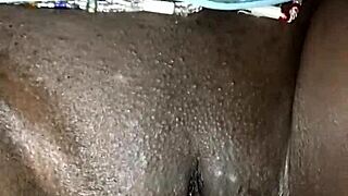 African maid's tight shaved pussy fingered intensely