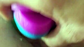 Chubby Brunette Uses Rainbow Dildo for Anal