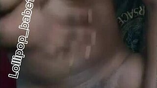 Check out this sexy black babe getting horny at home after smoking and shaking her ass