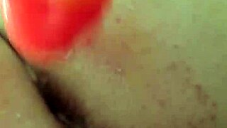 Chubby Brunette Uses Rainbow Dildo for Anal