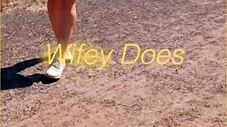 Look at this milf flashing her shaved pussy outdoors