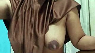 Stunning hijab student toys her ass in empty house