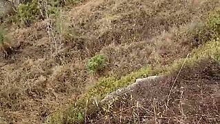 Petite milf gives blowjob outdoors in Cyprus nature.