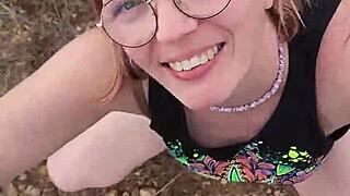 Petite milf gives blowjob outdoors in Cyprus nature.