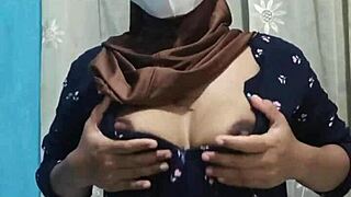 Stunning hijab student toys her ass in empty house