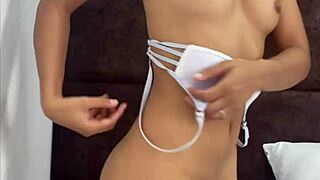 Latina teen in underwear pleasures herself solo